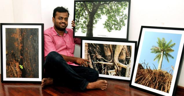freelance photographer kerala Mohammed Safi with his works / PHOTO: S. RAMESH KURUP / The Hindu 